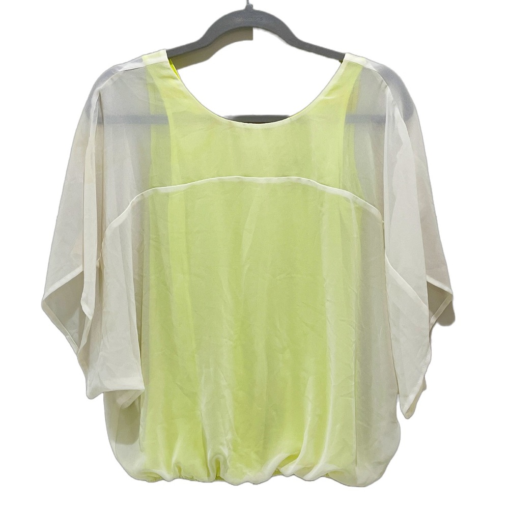 Express balloon bottom blouse with yellow tank lining and sheer overlay.